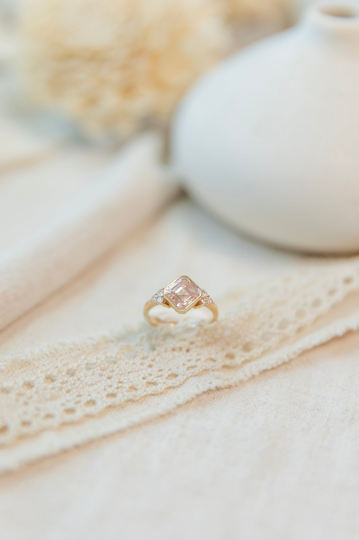 Pink asscher diamond on a gold ring
